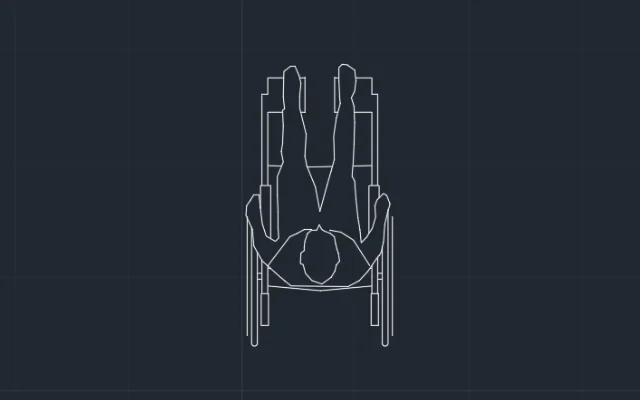 Imagen de bloque de persona sentada en silla de ruedas vista desde arriba