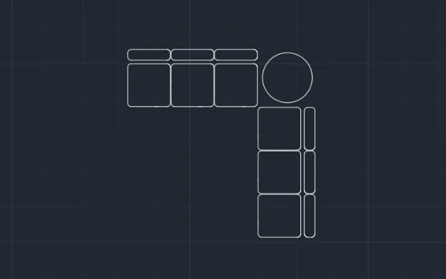 Imagen de bloque de sillones y una mesa que forman una L vistos desde arriba